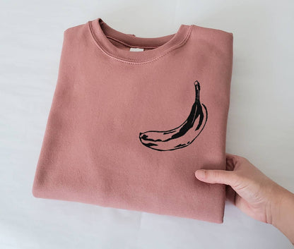 Sweat-shirt banane, col d’équipage imprimé à la main, pull de style unisexe, imprimé fruit minimaliste, pull en polaire blanche, imprimé lino, mode éthique
