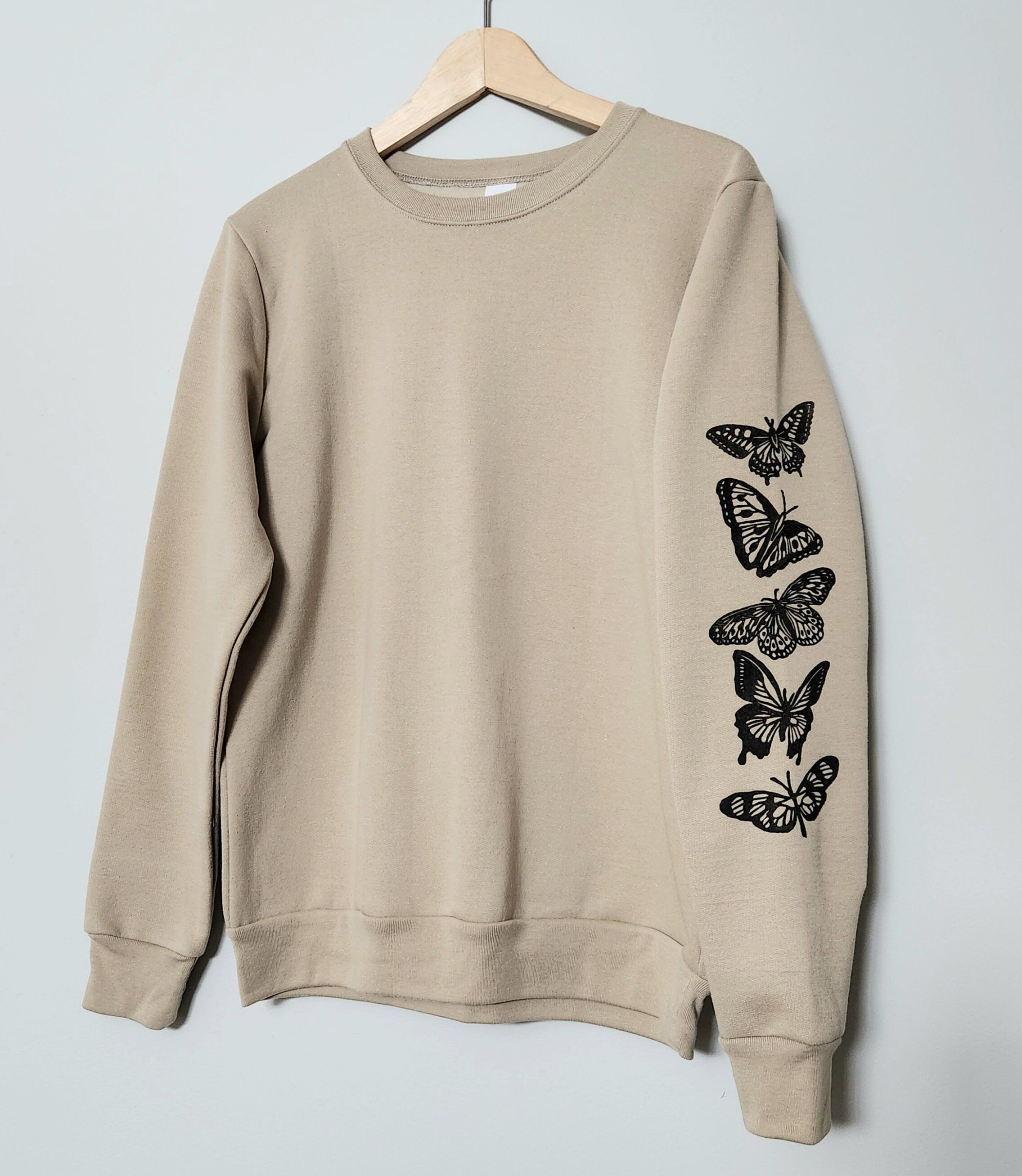 Sweatshirt with butterflies on sleeve sale